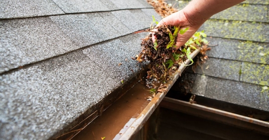Hand Cleaning Copper Rain Gutter
